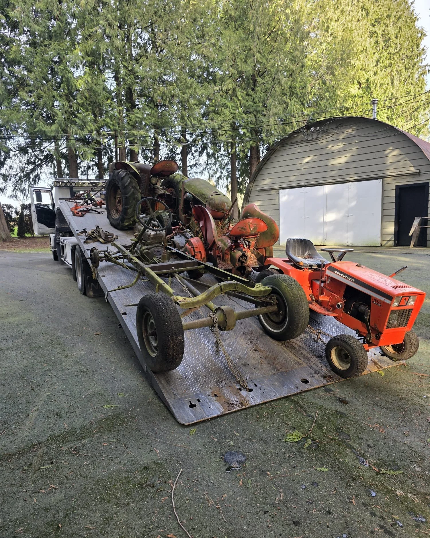 Vehicle chassis on a flatbed truck